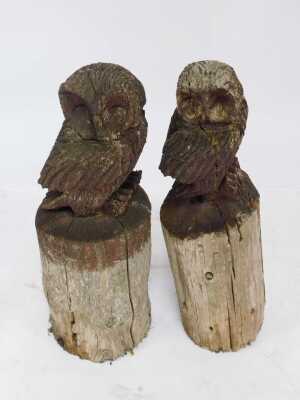 Two carved driftwood owls on plinths, overpainted in brown, 80cm high. (AF) (2) - 2