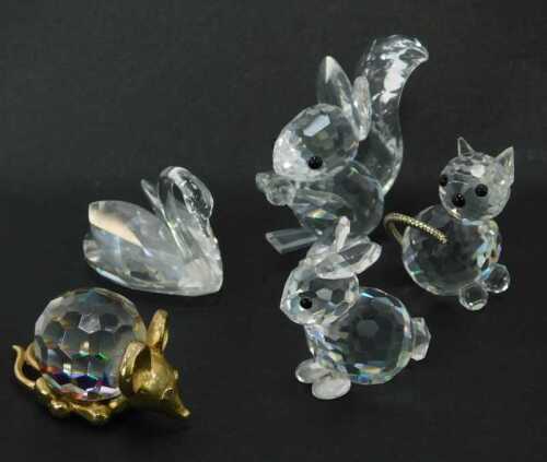 Five crystal animals, comprising four Swarovski to include squirrel, cat, swan and rabbit, and a Crystal Reflections Austrian crystal mouse, boxed. (5)