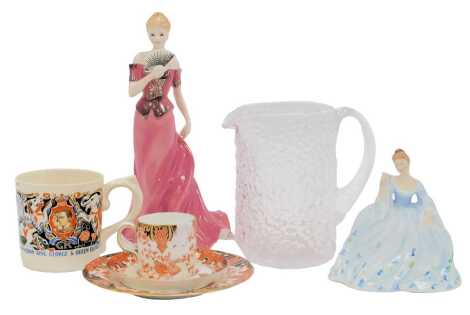 A Royal Worcester porcelain figure, modelled as Isabella, 24cm high, together with a Coalport porcelain figure modelled as June, a Royal Crown Derby coffee can trio, Whitefriars bark effect jug, 15cm high, and a Woods Ivory ware Laura Knight Coronation mu