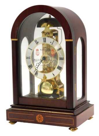 A skeleton clock, with silvered Roman numeric chapter ring for Sewills Liverpool, in a domed case, with faux inlay, on compressed brass feet, 30cm high.