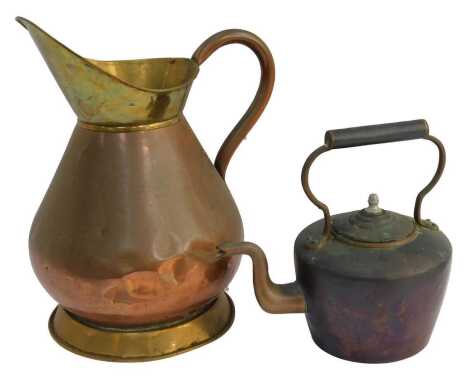 A 19thC copper and brass jug, 40cm high, together with a Victorian copper kettle. (2)