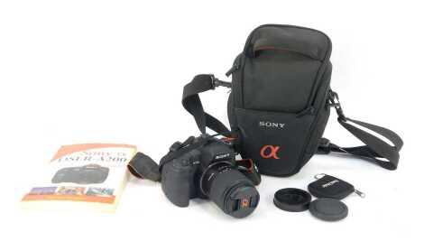 A Sony A200 digital camera, together with a 1.3ft macro lens, charging cable, manual, etc.