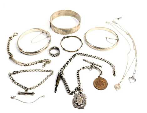 A group of silver and other jewellery, comprising three silver bangles, a silver watch chain with draughts crest, various white metal chains, unmarked, pewter ring, etc., 130.8g all in.