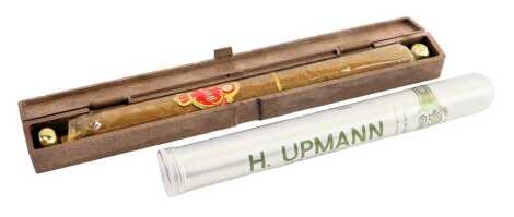 Two cased cigars, comprising a H Upmann Havana, in steel case, and a Wilhelm II Churchill, in Bakelite case. (2)