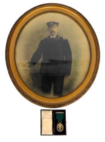 Military interest. A Victorian Volunteer Officer's Decoration, awarded 1892, to Major J. Steed (ret), 15th Middlesex (The Customs and the Docks), together with a printed photograph of the recipient in gilt frame, the picture 59cm x 51cm.