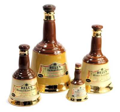 Four Bell's Scotch whisky decanters, of graduated form, the largest 75.7cl. (4)