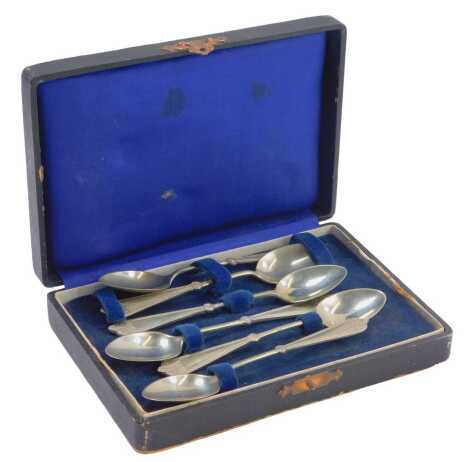 A cased set of six teaspoons, each with filigree decoration stamped Afghan FW Silver, in presentation box,