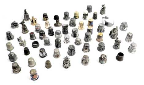 A group of silver and other thimbles, comprising an Art Nouveau style white metal thimble with blue cabochon decoration, various silver plated and ceramic thimbles, enamel, etc. (1 box)