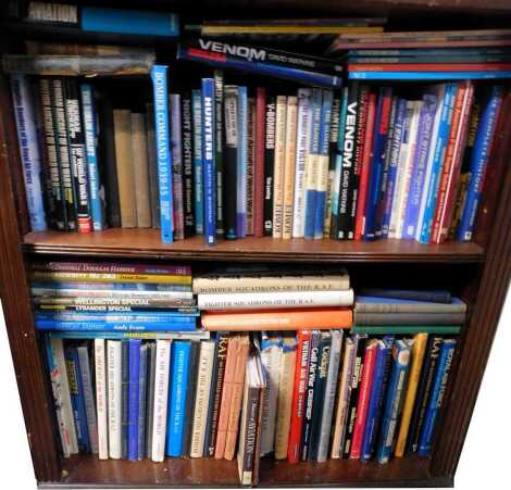 Various aircraft related books, to include The Air Forces of the World, Bomber Command 1939-45, The Gloster, further books relating to Vietnam, Spitfires, Hunters, etc. (2 shelves)