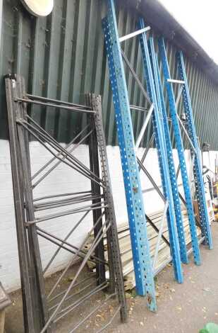 Various warehouse shelving, comprising four blue upright supports and five black sectional supports with various shelves, the blue uprights 310cm high, 69cm and 92cm wide, the black uprights 204cm high, 86cm wide.