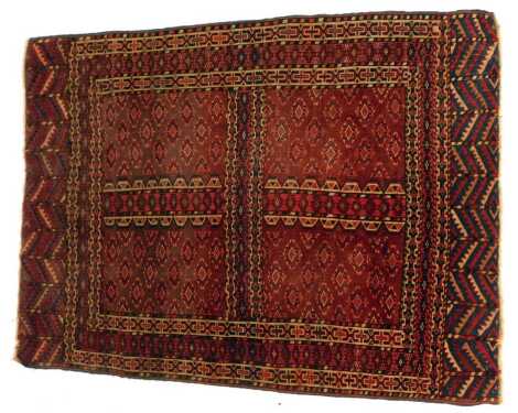 A Turkoman Yomut Ensi rug, red ground, 170cm x 125cm.