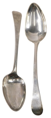 A set of four George III silver Old English pattern serving spoons, Newcastle 1799, makers marks all indistinct, 8.60oz.