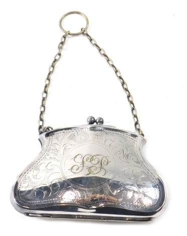 A Victorian silver purse, with engine engraved decoration bearing the initials LP, with purple lined interior, rubbed hallmarks, on a plated chain, 2.84oz.