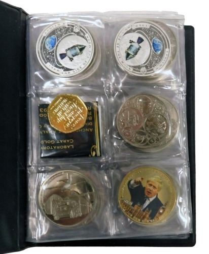 An album of five pound and other collectors coins, to include D-day anniversary, 50th anniversary of the fifty pence, V for Victory, Disney Winnie the Pooh, and others. (1 album)