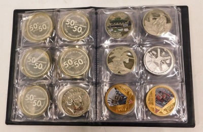 An album of five pound and other collectors coins, to include D-day anniversary, 50th anniversary of the fifty pence, V for Victory, Disney Winnie the Pooh, and others. (1 album) - 4