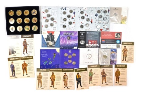 Collectors coins, comprising Mint editions D-day forces gold plated on brass coin collection, The Royal Mint One Nation Made by Many, celebrating twenty five years of the two pound coin, The Great British Coin Hunt A-Z some missing, five pound cupronickel