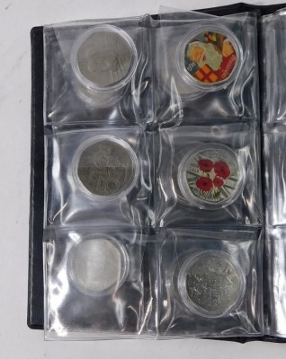 A collection of fifty pence collectors coins, to include World War commemorative, Christmas, Paddington, Victory, Gruffalo, and others. (1 album) - 2