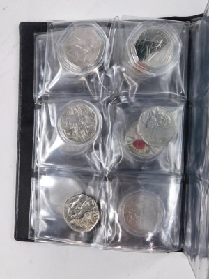 A collection of fifty pence collectors coins, to include World War commemorative, Christmas, Paddington, Victory, Gruffalo, and others. (1 album) - 3