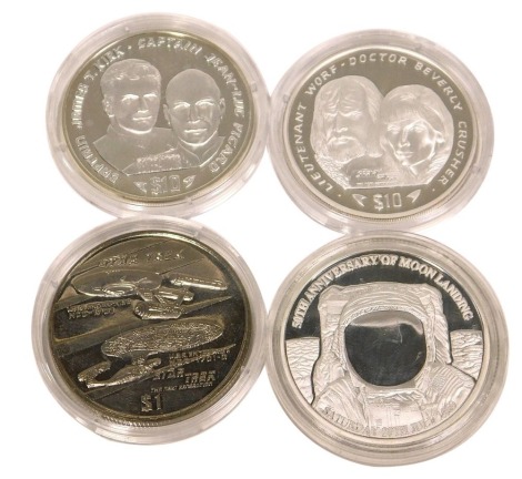 Four silver collectors coins, comprising the one dollar Star Trek Next Generation 1 Liberian One Dollar, Lieutenant Worf Doctor Beverley Crusher Star Trek and James T Kirk Captain Jean-Luc Picard 10 Dollars, and The 50th Anniversary of the Moon Landing Co