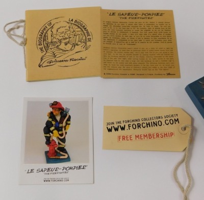 A model of a French fireman, label for The Comic Art of Guillermo Forchino, titled Le Sapeur-Pompier, limited edition number 01900, with some paperwork, 39cm high. - 6