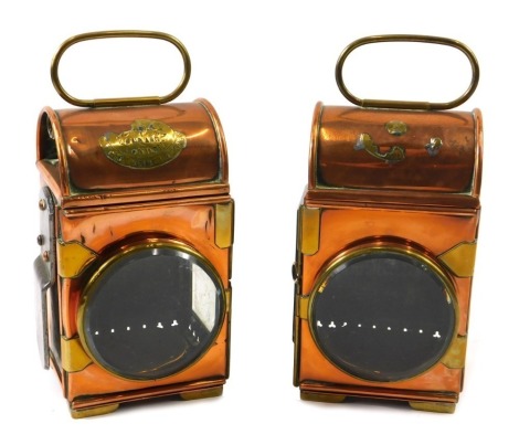 Two copper and brass lamps, partial oval label for Longacre London Fire Engine Makers, 26cm high. (2)