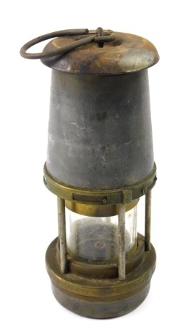 A Wolf Type FS Miners lamp, in brass and galvanised metal, 21cm high.