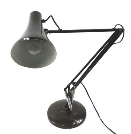 An Anglepoise style lamp, brown paint, on a domed foot. (AF)