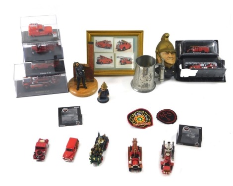 A quantity of fire brigade related items, to include diecast vehicles, wall plaque, mug, etc. (2 trays)