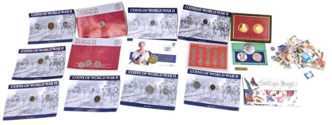 Collectors coins and stamps, including loose stamps, Falkland Island anniversary coins, coins of WWII, etc. (1 tray)