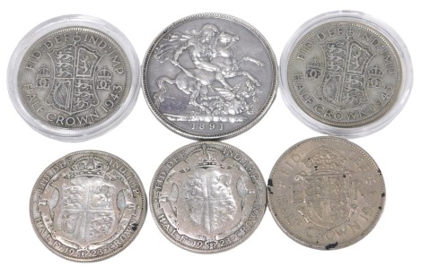 Victorian and later coins, to include two 1923 silver half crowns, a 1963 half crown, 1943 half crown, 1891 Victoria Regina crown, and a 1945 half crown. (6)