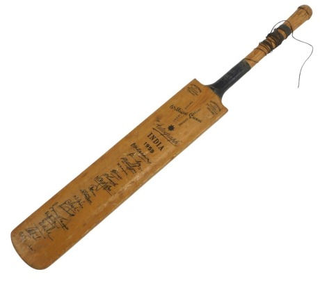 A William Gunn miniature cricket bat, the autograph India 1959, stamped Gunn & Moore Nottingham, 29cm high.