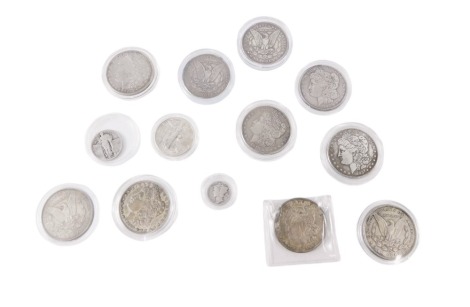 A group of United States of America one dollars, to include 1893, 1878, 1889, 1893, 1885, and others, enclosed in a coin collection case.