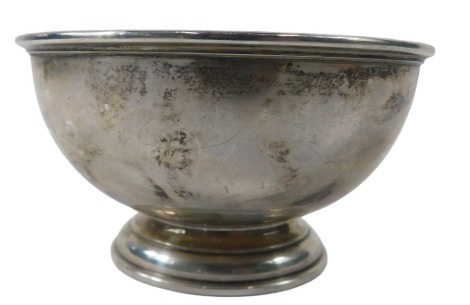 A George VI silver sugar bowl, with lipped border, on a stepped foot, of plain design, maker RC, London 1937, 2.73oz.