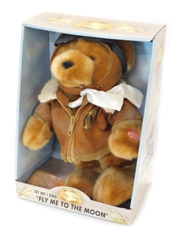 A 100th anniversary of the Wright Brothers Flight musical teddy bear, boxed.