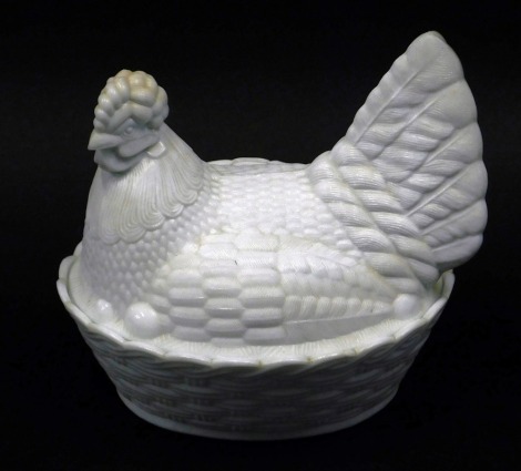 A press moulded glass hen egg tureen, 23cm wide.