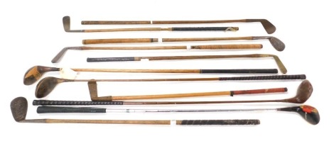 A quantity of hickory and other shafted vintage gold clubs, to include woods and irons.