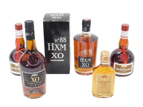 A HXM XO No. 88 French brandy, Tesco Finest XO Five Year Scotch brandy, two Grand Marina liqueurs, and a Napoleon brandy. (5)