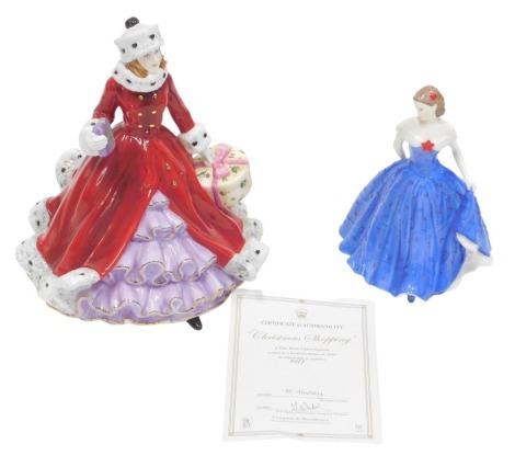 Two figures, comprising Royal Worcester Isabelle, and Compton & Woodhouse Christmas Shopping limited edition number 17/2950, 14cm and 20cm high.