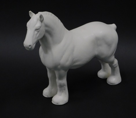 A Beswick white matte figure of a shire horse, 26cm high. (AF)