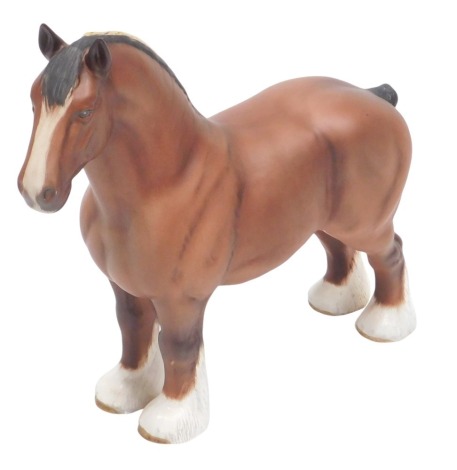 A Beswick matte glazed brown shire horse, 25cm high.