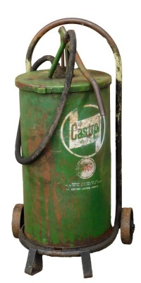 A Castrol oil drum on wheel support, painted in green, 87cm high.