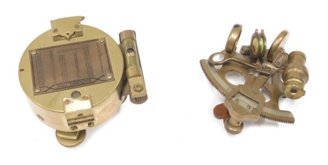 A reproduction brass compass, and a brass sextant marked Sestrel London number 6688. (2)