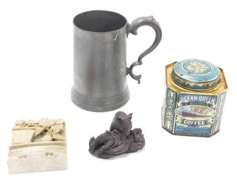 A pewter tankard, a carved soapstone floral group, resin mouse figure, and an Ocean Queen Blend Coffee advertising tin. (4)