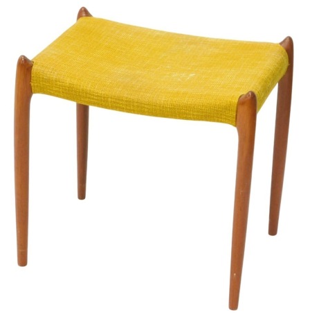 A Danish Moller Models teak stool, with a gold slub design fabric and turned tapering legs, 49cm wide. The upholstery in this lot does not comply with the 1988 (Fire & Fire Furnishing) Regulations, unless sold to a known exporter or upholsterer it will b