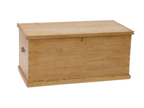 A Victorian stripped pine blanket box, the rectangular top enclosing a candle box, on a plinth, 92cm wide.