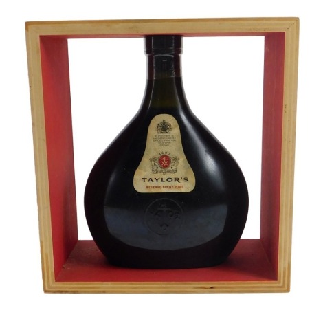 A bottle of Taylor's Reserve Tawny Port, in fitted casing.