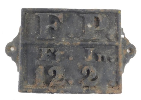 A cast iron plaque, stamped in raised letters F.P.Et.In.122, 26cm wide.