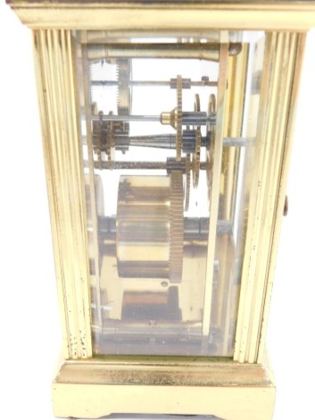 A Garrard and Co Limited brass carriage clock, with hinged handle, engraved to reverse Ruston Gas Turbines Limited A.I. Mawer (1956-1981), 15cm high.