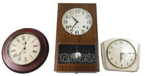 A Wehrle wall clock, in ceramic case, and two other clocks.