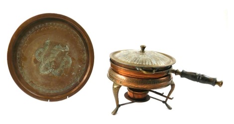 An Eastern engraved copper pan stand and tray, with burner.